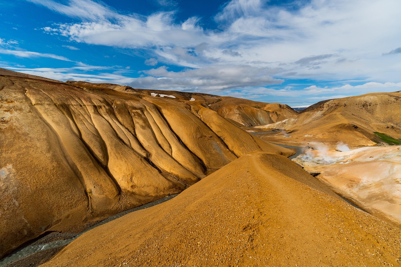 Iceland's dramatic volcanic landscape with green moss-covered lava fields and mountains