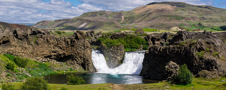 Hjalparfoss is, with many, a favourite waterfall in Iceland. Among the favourite waterfalls in Iceland, it’s among those which are on the golden circle